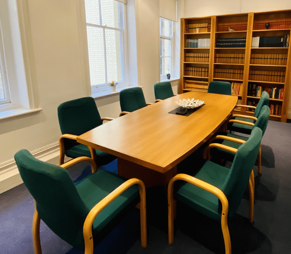 Board room meeting room oak table green chairs